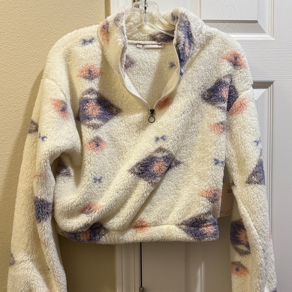 SO Cream and Purple Patterned Women's Fleece half zip coat. New with tags size S